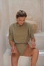 Mona swim set with Ana skirt in olive, showcasing chic modest swimwear for a stylish look.