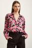Modest Satin Shirt in Pink Floral print, tucked in for a polished look.