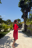 Plus size red modest swimsuit dress with flattering fit, perfect for modest beachwear and active swimming.