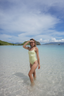 Modest one-piece swimsuit in honeydew green and melon orange – NAYA style with UV-blocking fabric for sun-safe fashion.