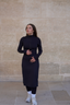 Back view of the 26-inch modest sport skirt with integrated leggings, offering full coverage and comfort for modest activewear. Tznius sport skirt.
