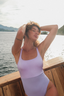 Tznius swimwear one-piece – NAYA in soft purple and fairy tale, ideal for plus size women looking for a flattering and modest swimsuit.