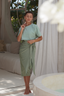 Elegant modest Naya Swim Set featuring a Lichen/Sage shiny one-piece, lightweight Sage skirt, and UV protection for Muslim and Jewish women.