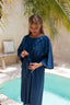 Back view of Emma Swim Dress in Indigo, offering full coverage for an elegant modest swimsuit look