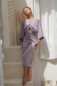 Mia modest swimsuit set in mauve with adjustable one-piece, top, and wrap skirt for versatile beachwear.