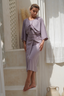 Three-piece Mia swimsuit set in mauve, featuring a modest top, wrap skirt, and adjustable one-piece suit.