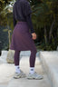 Modest sport skirt with integrated legging in muted plum, designed for women seeking modest activewear with full coverage.
