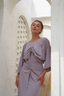 Versatile Mia modest swimsuit set in mauve, with a wrap skirt, top, and one-piece suit for full coverage.