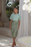 Modest swimwear set with shiny Lichen/Sage one-piece and lightweight Sage Elina 2.0 wrap-style skirt for full coverage.