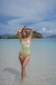 NAYA swimwear in honeydew and melon – colorblock modest swimsuit with full sun protection and minimalist design.