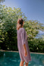 Back view of Emma Swim Dress in Mauve, offering full coverage for an elegant modest swimsuit look